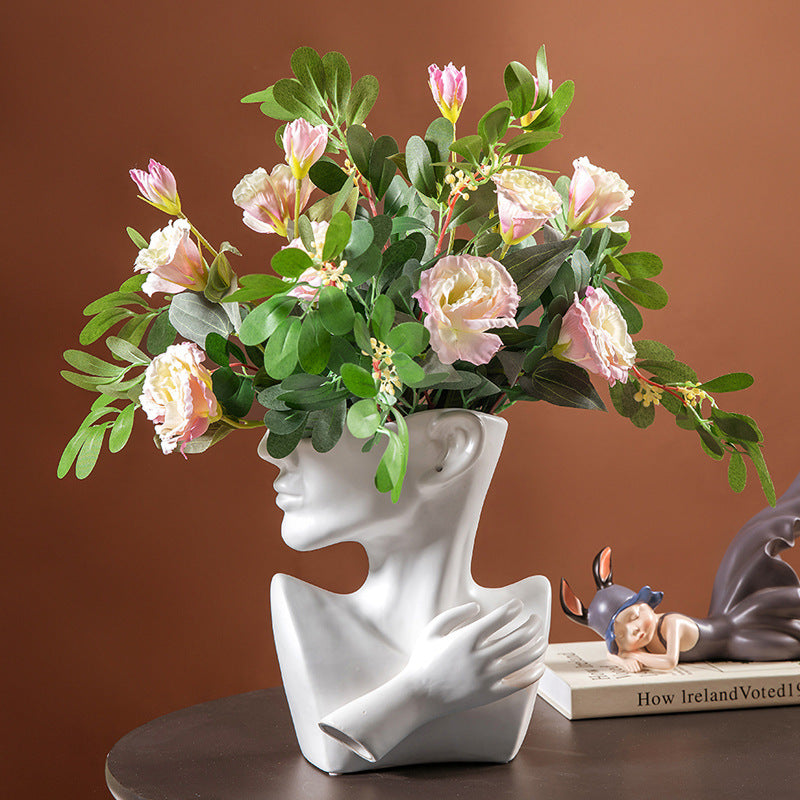 Ceramic human face art vase floral