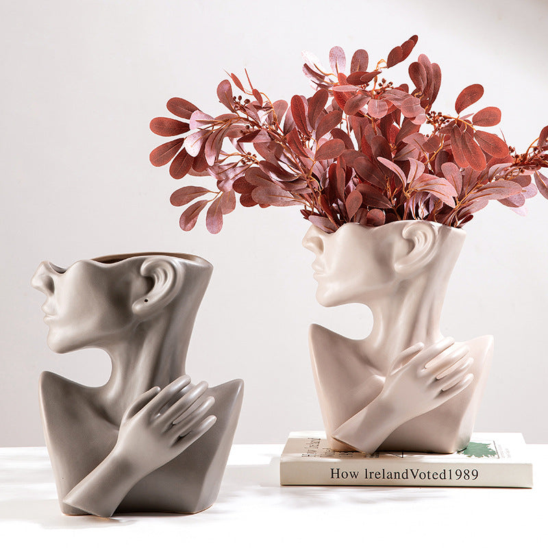 Ceramic human face art vase floral